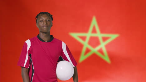 Young-Footballer-Posing-In-Front-of-Morocco-Flag-01