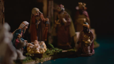 Studio-Christmas-Concept-Of-Baby-Jesus-In-Manger-With-Figures-From-Nativity-Scene-1