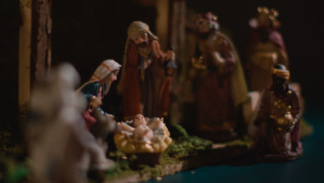 Studio-Christmas-Concept-Of-Baby-Jesus-In-Manger-With-Figures-From-Nativity-Scene-2