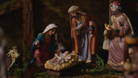 Studio-Christmas-Concept-Of-Baby-Jesus-In-Manger-With-Figures-From-Nativity-Scene-5