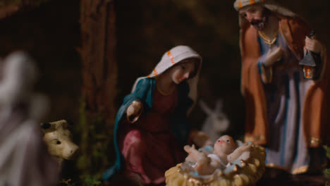 Studio-Christmas-Concept-Of-Baby-Jesus-In-Manger-With-Figures-From-Nativity-Scene-8