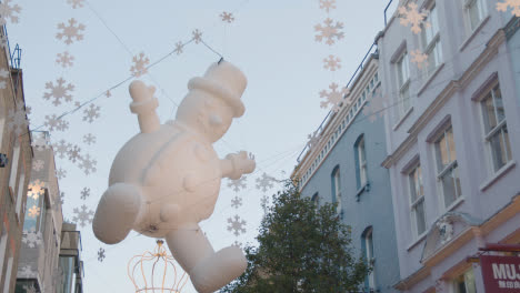 Close-Up-Of-Christmas-Decorations-Above-London-UK-Carnaby-Street