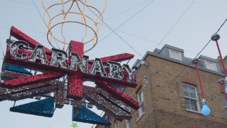 Close-Up-Of-Christmas-Decorations-Above-London-UK-Carnaby-Street-2