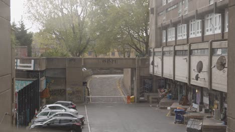 Inner-City-Housing-Development-In-Tower-Hamlets-London-UK-With-Car-Park-And-Rubbish