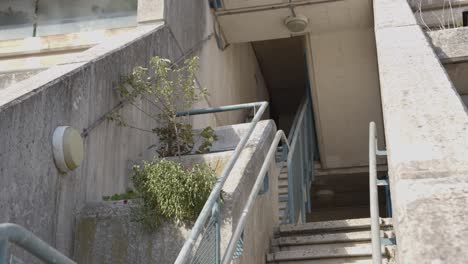 Close-Up-Of-Steps-Outside-Inner-City-Housing-Development-In-Tower-Hamlets-London-UK