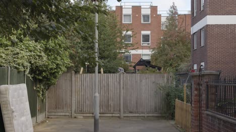 Inner-City-Housing-Development-In-Tower-Hamlets-London-UK-With-Discarded-Mattress-1