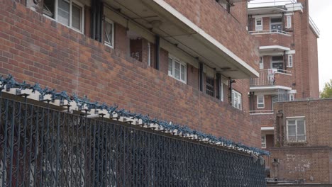 Security-Fencing-Outside-Inner-City-Housing-Development-In-Tower-Hamlets-London-UK-4