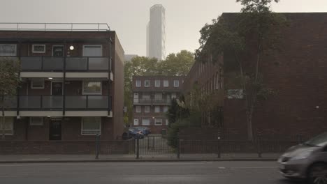 Contrast-Between-Poor-Inner-City-Housing-Development-And-Offices-Of-Wealthy-Financial-Institutions-London-UK-3