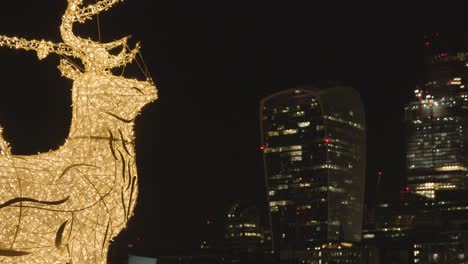 Night-Skyline-From-South-Bank-With-City-Of-London-Offices-And-Christmas-Decoration-In-Foreground