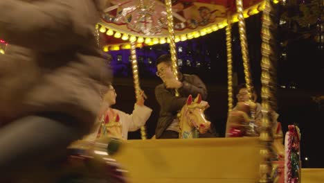 Fairground-Roundabout-Ride-At-Christmas-Market-On-London's-South-Bank-At-Night-1