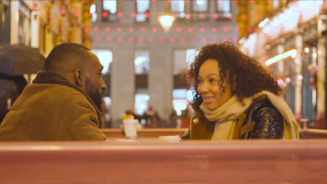 Couple-Meeting-For-Hot-Drink-At-Table-At-Outdoor-Cafe-In-Leadenhall-Market-London-UK-2