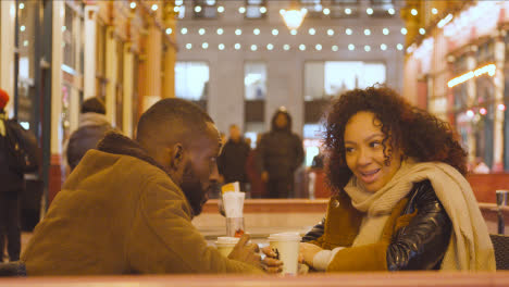 Couple-Meeting-For-Hot-Drink-At-Table-At-Outdoor-Cafe-In-Leadenhall-Market-London-UK-5