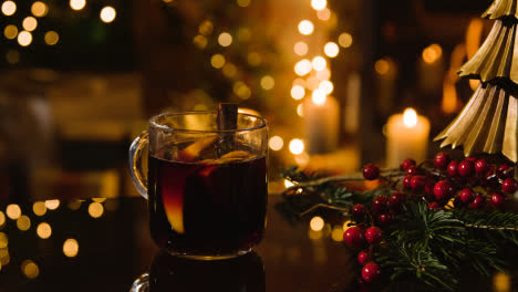 Christmas-At-Home-With-Glass-Of-Mulled-Wine-On-Table