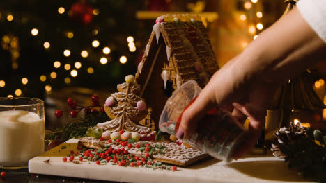 Christmas-Food-At-Home-Pouring-Sprinkles-onto-Gingerbread-House--3