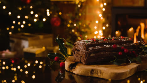 Christmas-Food-At-Home-And-Traditional-Yule-Log-On-Table