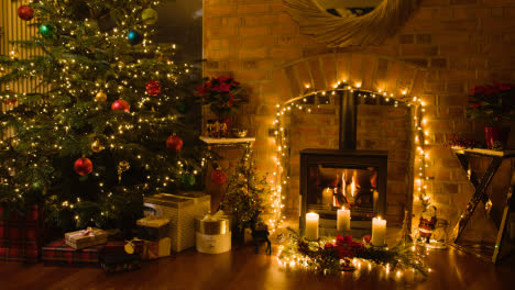 Christmas-At-Home-With-Presents-Around-Tree-Fire-And-Candles-1