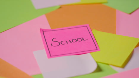 Education-Concept-Of-Revolving-Sticky-Notes-With-School-Written-On-Top-Note-1