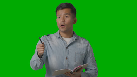 Male-Teacher-Talking-To-School-University-Or-College-Class-In-Lesson-Against-Green-Screen-2