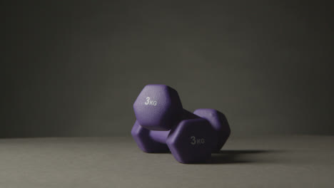 Fitness-Studio-Shot-Of-Exercise-Dumbbell-Weights-Against-Grey-Background-8