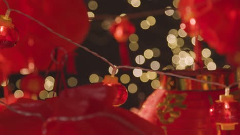 Close-Up-Of-Decorative-Lights-With-Chinese-New-Year-Lanterns-In-Background-1