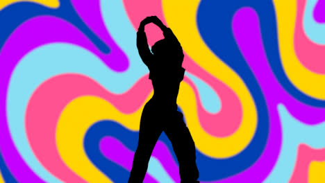 Studio-Silhouette-Of-Woman-Dancing-Against-Multi-Coloured-Pattern-Background