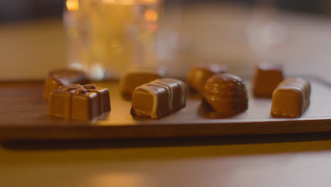 Close-Up-Of-Chocolates-On-Tray-For-Valentines-Day-On-Table-