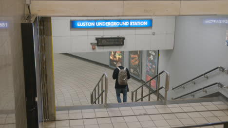Steps-Leading-To-Entrance-To-Underground-Station-At-London-Euston-UK-With-Passenger