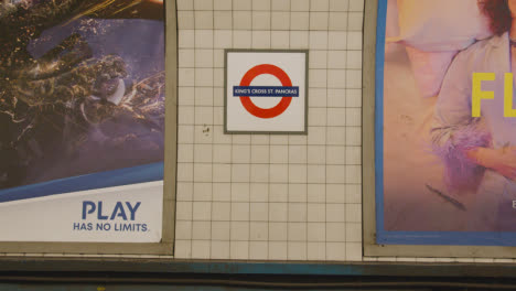 Station-Sign-And-Logo-For-King's-Cross-St-Pancras-Underground-Tube-Station-London-UK