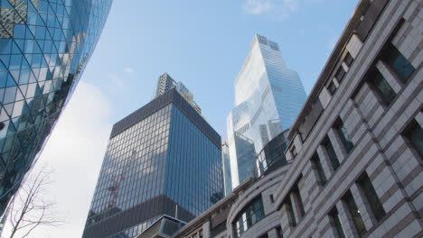 Exterior-Of-The-Cheesegrater-And-The-Gherkin-Modern-Office-Buildings-In-City-Of-London-UK