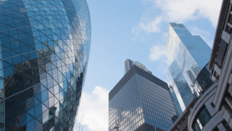 Exterior-Of-The-Cheesegrater-And-The-Gherkin-Modern-Office-Buildings-In-City-Of-London-UK-1