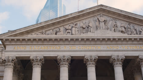 Close-Up-Showing-Exterior-Of-The-Royal-Exchange-Building-With-Modern-Offices-In-City-Of-London-UK