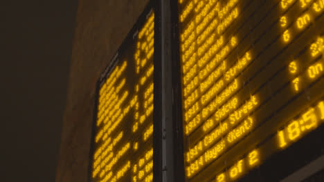 Close-Up-Of-Departure-Board-At-London-Bridge-Rail-Station-In-London-UK-At-Night-1