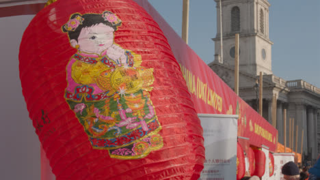 Market-Stalls-Around-Trafalgar-Square-In-London-UK-With-Crowds-Celebrating-Chinese-New-Year-2023-2