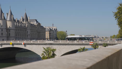Pont-Saint-Michel-Bridge-Crossing-River-Seine-In-Paris-France-With-Tourists-And-Traffic-1