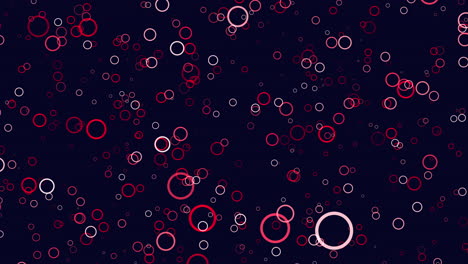 Circular-red-circles-floating-on-black-background,-abstract-pattern
