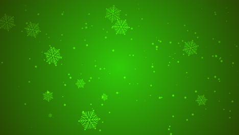 Falling-snow-and-glitters-on-green-gradient