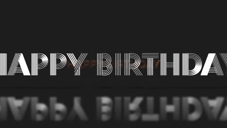 Reflective-metal-text-Happy-Birthday-in-orange-and-black-on-black-background