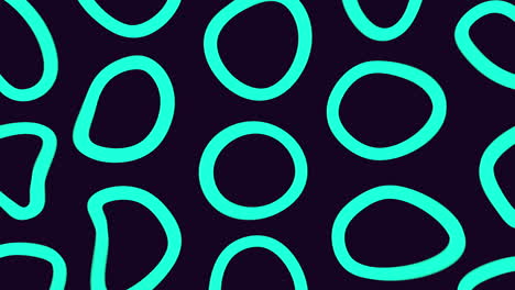 Black-and-yellow-pattern-of-overlapping-circles-and-ovals-on-dark-background