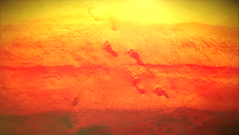 Lone-footsteps-on-vibrant-sandy-beach-under-sparkling-sun