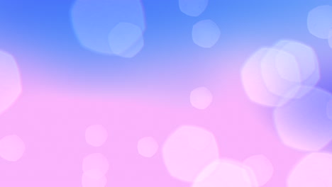 Vibrant-and-dynamic-blurred-pink-and-blue-circles-on-light-blue-background