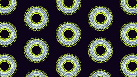 Circular-pattern-of-blue-outlined-circles-on-black-background