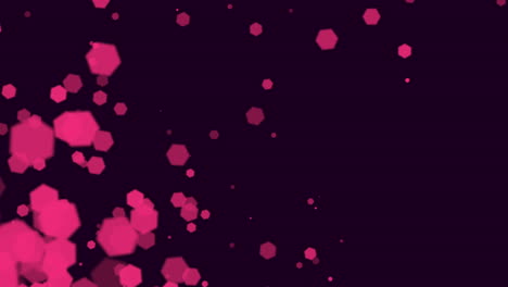 Dazzling-pink-and-purple-dot-pattern-on-dark-background