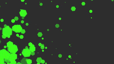 Vibrant-green-circles-scatter-across-a-dark-background-in-striking-pattern