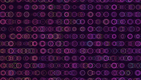 Purple-and-pink-circles-pattern-on-black-background-vibrant-and-versatile-graphic-design