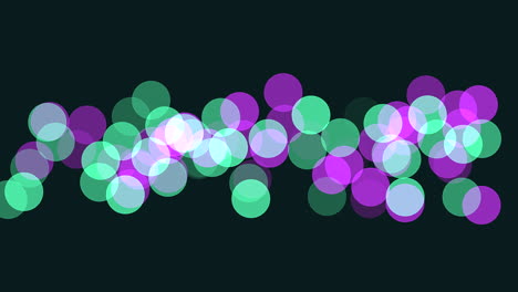 Vibrant-glowing-circles-radiant-purple-and-green-pattern-on-black-background