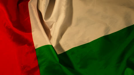 Overhead-Full-Frame-Studio-Close-Up-Shot-Showing-National-Flag-Of-UAE-United-Arab-Emirates-Revolving