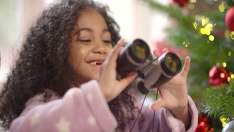 Child-Playing-with-Binoculars-at-Christmas-1