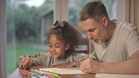 Dad-and-Daughter-Drawing-Together