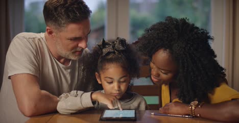 Parents-and-Child-Learning-With-Tablet