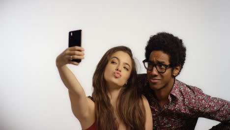 Couple-Have-Fun-Taking-Selfies